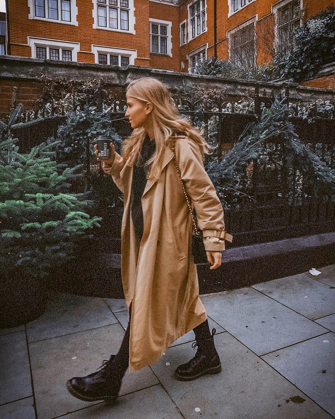 Long camel coat and black leather combat boots for fall 2021