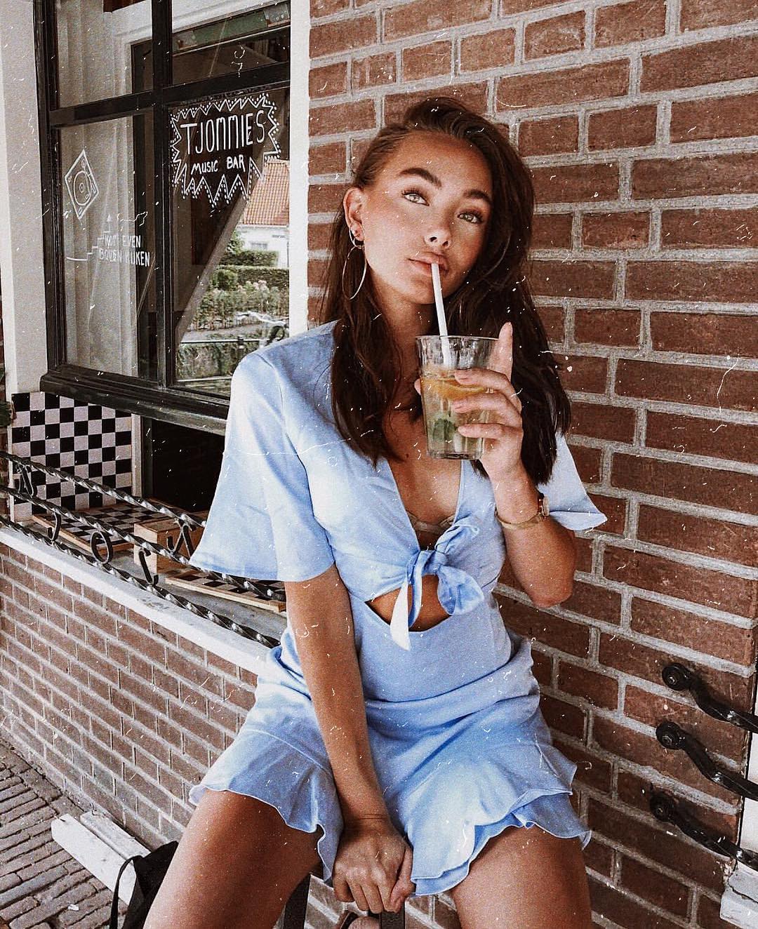 Pastel blue dress with a front neckline for summer 2021