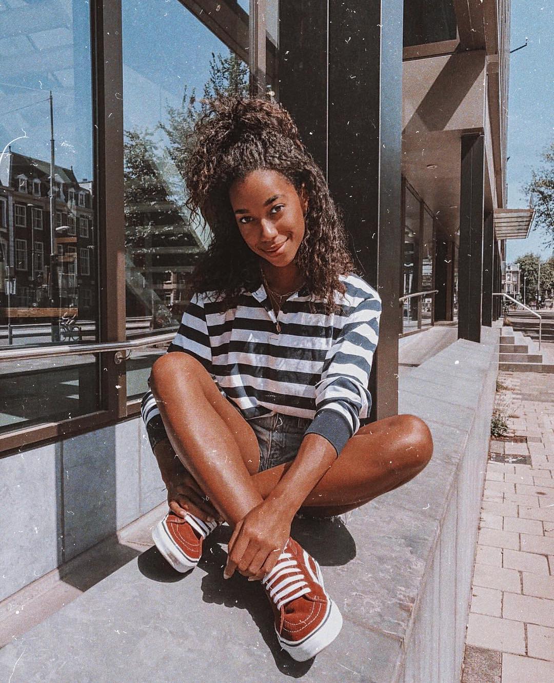Striped long-sleeved top, denim shorts and trainers for summer 2021