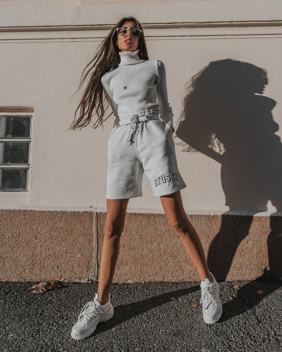 Turtlenecks, shorts, sneakers: a monochrome look for spring 2021