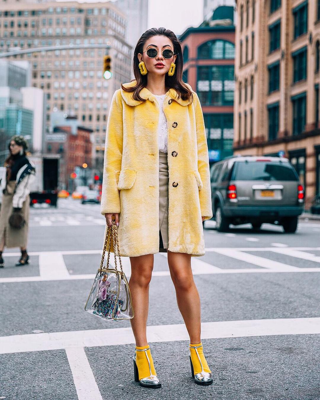 Pastel Yellow Fur Coat And Silver Heels
With Yellow Socks Outfit