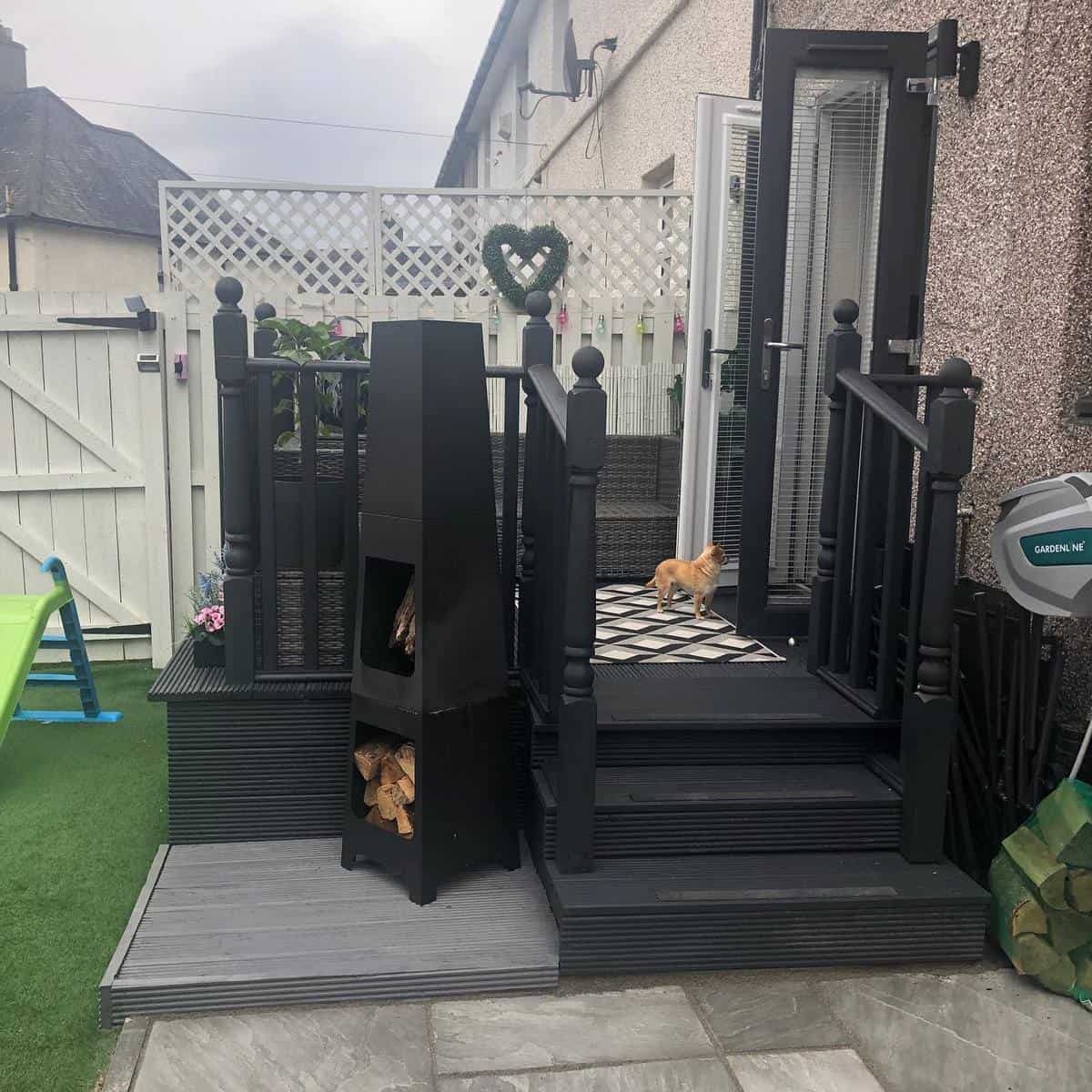 Small tile deck, black rails, dog