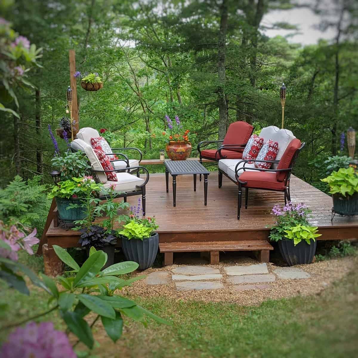 Exposed wooden terrace with modern furniture 