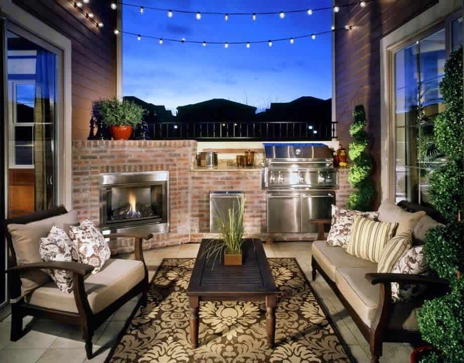 Outdoor terrace with brick barbecue fireplace 