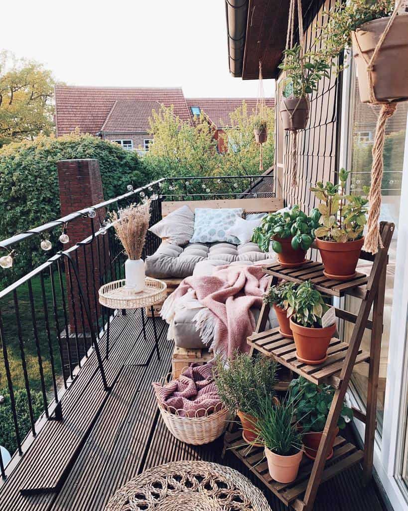 Small wooden deck potted plants, pallet couch