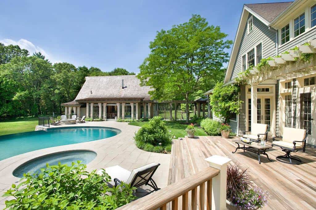 Wooden deck, large pool, small pool house