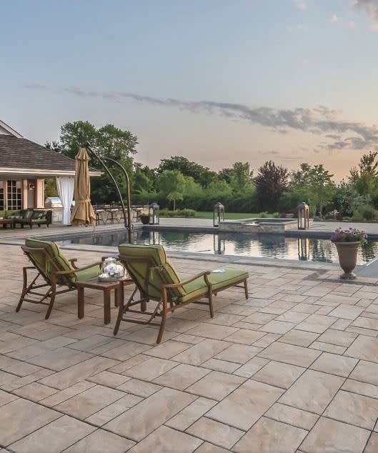 large pool deck pavers, pool loungers 