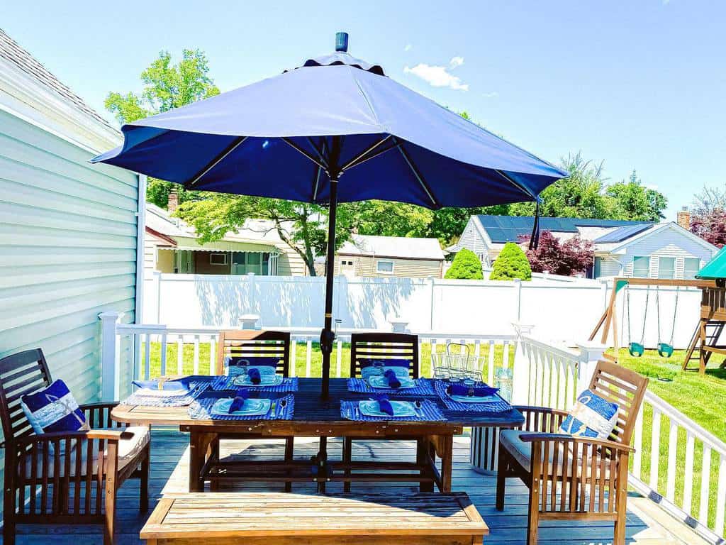 Modern blue wooden shade dining table with deck 