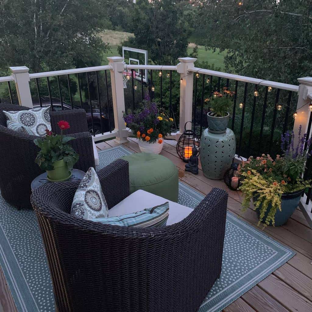 Wooden deck, wicker furniture, potted plants, view of basketball net