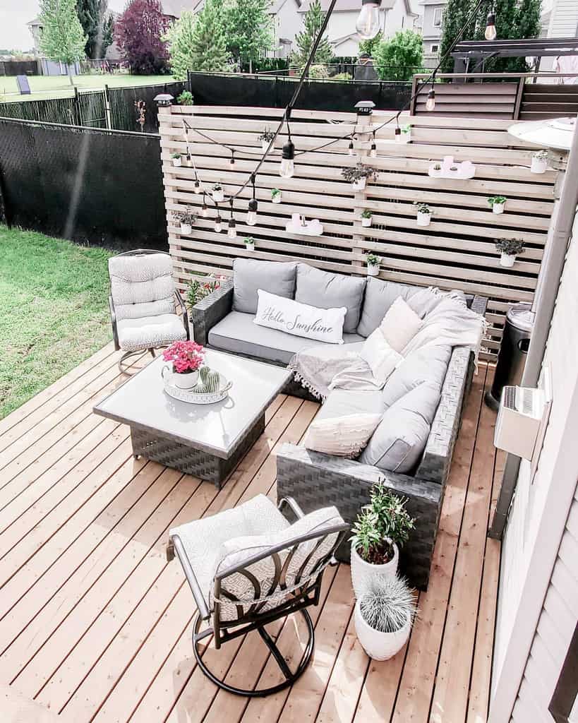 Privacy fence made of wooden slats for the backyard patio 