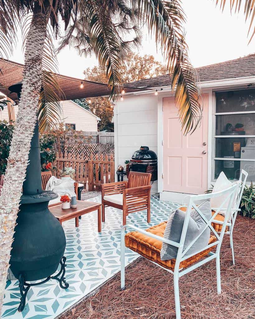 Boho-style patio with tiled floors and fire pit