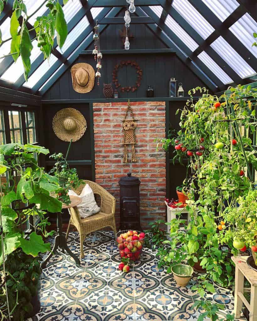 Greenhouse vegetable garden with brick wall