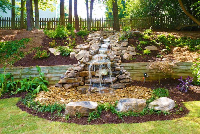 Add a waterfall #hillsidelandscaping #budget #decorhomeideas